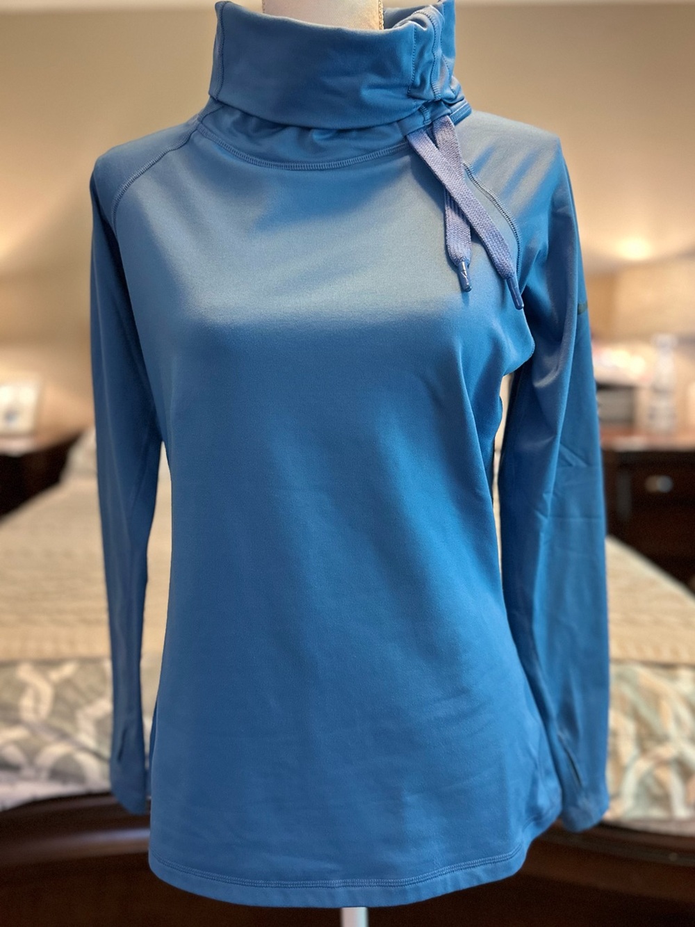 Nike Pro Cowlneck Pullover Sweatshirt featuring a  drawstring neck